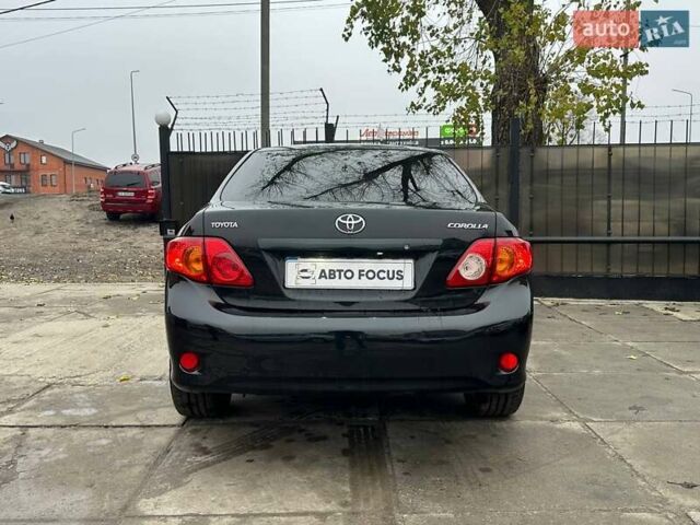 Чорний Тойота Королла, об'ємом двигуна 1.6 л та пробігом 316 тис. км за 7490 $, фото 5 на Automoto.ua