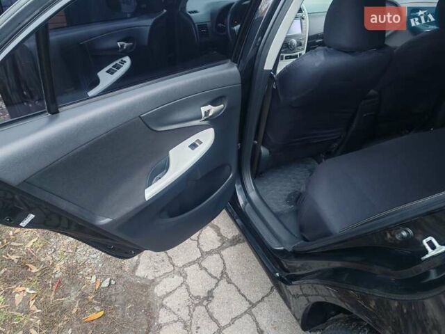 Черный Тойота Королла, объемом двигателя 1.6 л и пробегом 210 тыс. км за 6200 $, фото 9 на Automoto.ua