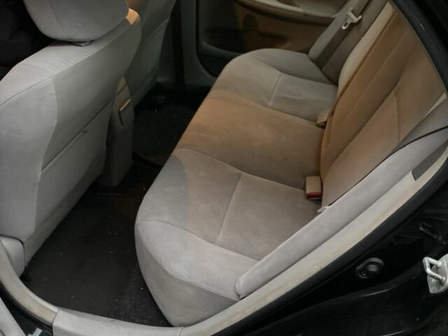 Чорний Тойота Королла, об'ємом двигуна 1.8 л та пробігом 204 тис. км за 5299 $, фото 17 на Automoto.ua