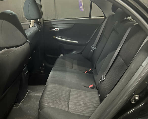 Черный Тойота Королла, объемом двигателя 1.6 л и пробегом 158 тыс. км за 7500 $, фото 6 на Automoto.ua