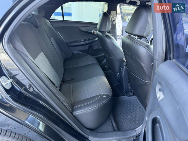 Чорний Тойота Королла, об'ємом двигуна 1.6 л та пробігом 221 тис. км за 6799 $, фото 7 на Automoto.ua