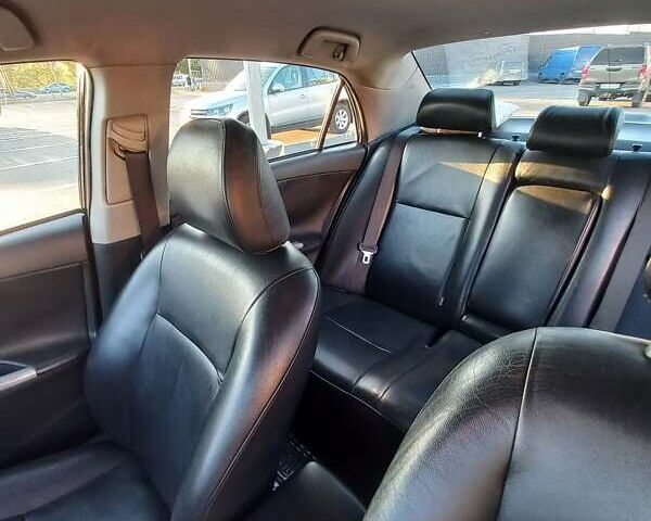 Чорний Тойота Королла, об'ємом двигуна 1.6 л та пробігом 235 тис. км за 6800 $, фото 12 на Automoto.ua