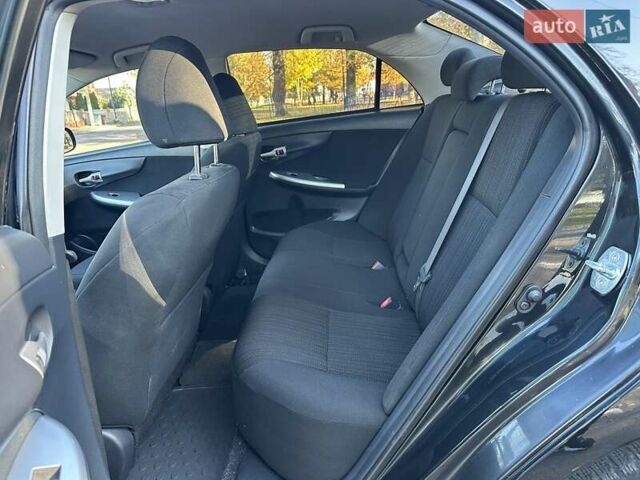 Чорний Тойота Королла, об'ємом двигуна 1.6 л та пробігом 193 тис. км за 5999 $, фото 16 на Automoto.ua