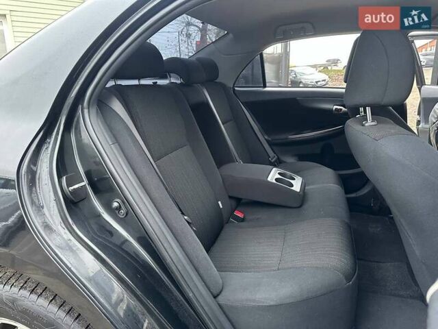 Чорний Тойота Королла, об'ємом двигуна 1.6 л та пробігом 316 тис. км за 7490 $, фото 10 на Automoto.ua