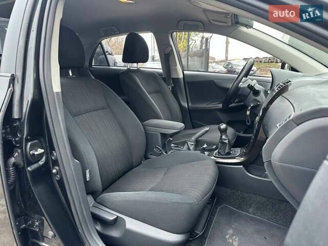 Чорний Тойота Королла, об'ємом двигуна 1.6 л та пробігом 316 тис. км за 7490 $, фото 11 на Automoto.ua