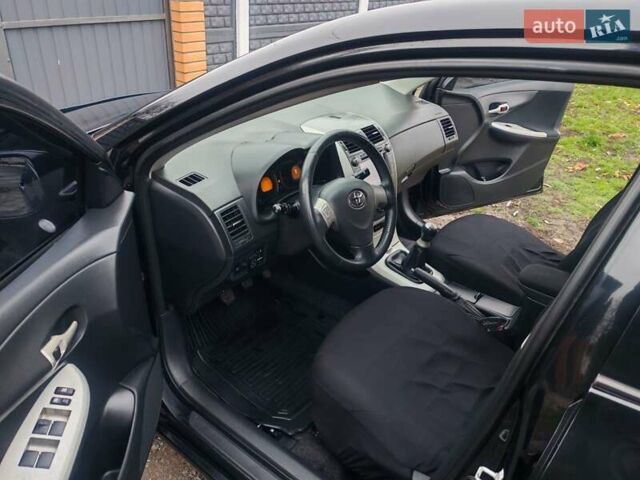 Черный Тойота Королла, объемом двигателя 1.6 л и пробегом 210 тыс. км за 6200 $, фото 1 на Automoto.ua