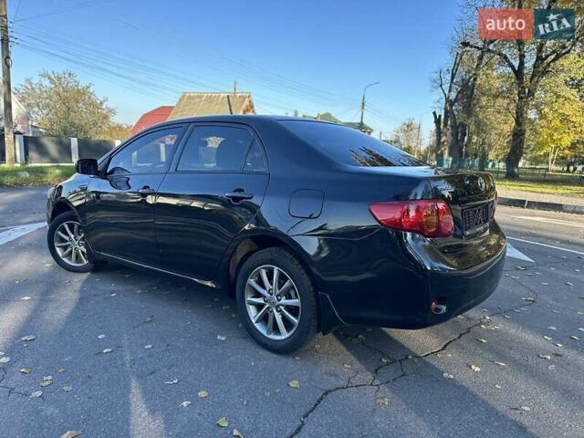 Чорний Тойота Королла, об'ємом двигуна 1.6 л та пробігом 193 тис. км за 5999 $, фото 31 на Automoto.ua