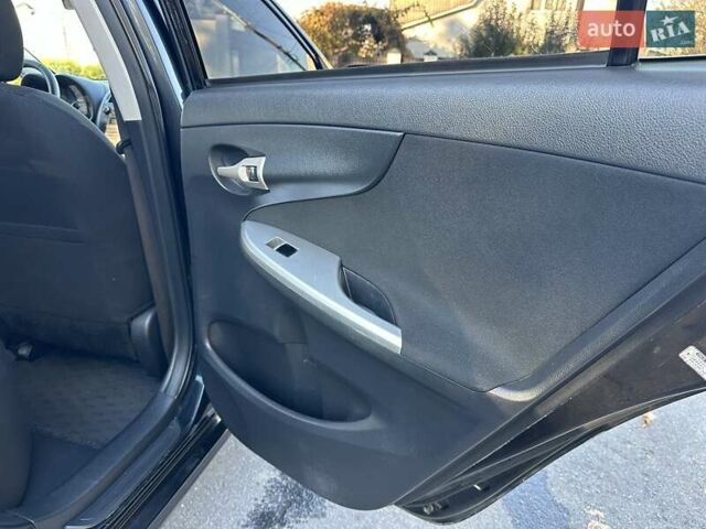 Чорний Тойота Королла, об'ємом двигуна 1.6 л та пробігом 193 тис. км за 5999 $, фото 17 на Automoto.ua