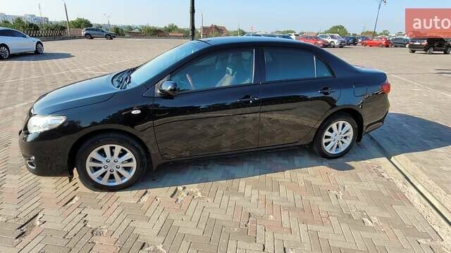 Чорний Тойота Королла, об'ємом двигуна 1.6 л та пробігом 254 тис. км за 6700 $, фото 1 на Automoto.ua