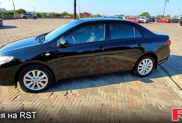 Чорний Тойота Королла, об'ємом двигуна 1.6 л та пробігом 254 тис. км за 6700 $, фото 3 на Automoto.ua