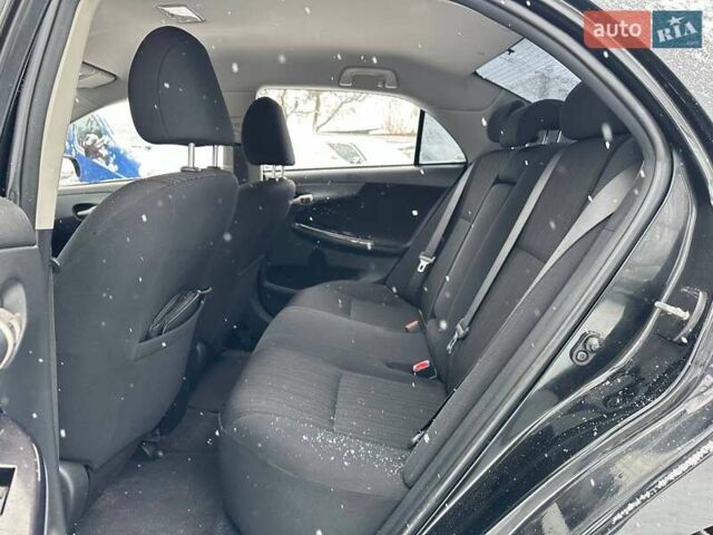 Черный Тойота Королла, объемом двигателя 1.6 л и пробегом 316 тыс. км за 6990 $, фото 9 на Automoto.ua