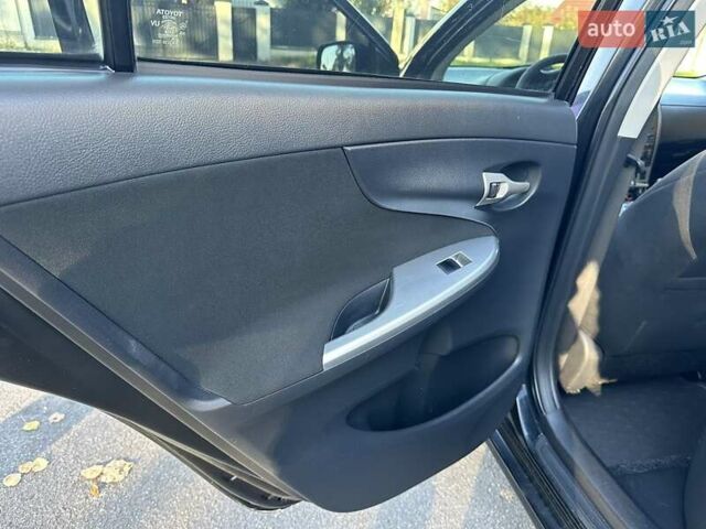 Чорний Тойота Королла, об'ємом двигуна 1.6 л та пробігом 193 тис. км за 5999 $, фото 27 на Automoto.ua