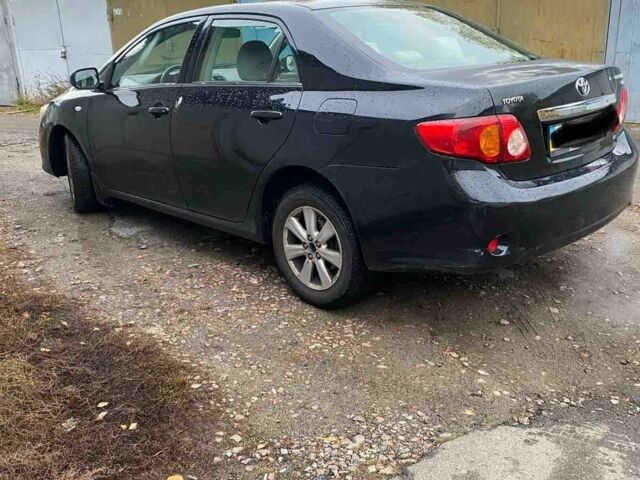 Чорний Тойота Королла, об'ємом двигуна 1.8 л та пробігом 205 тис. км за 5500 $, фото 3 на Automoto.ua