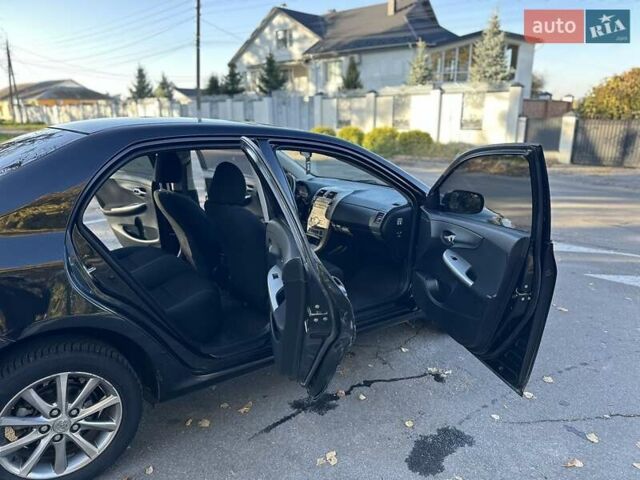 Чорний Тойота Королла, об'ємом двигуна 1.6 л та пробігом 193 тис. км за 5999 $, фото 8 на Automoto.ua