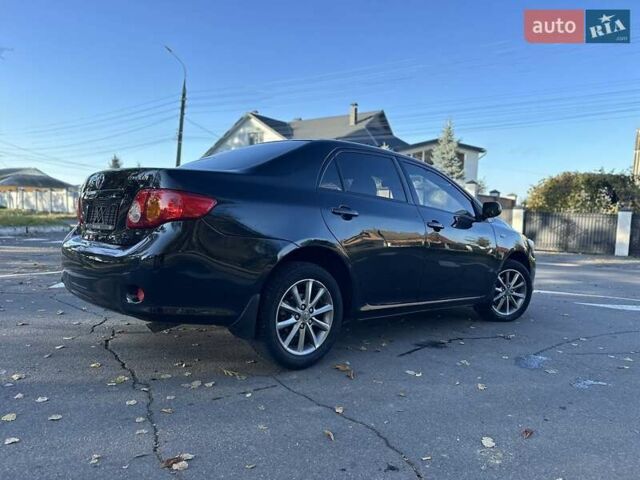 Чорний Тойота Королла, об'ємом двигуна 1.6 л та пробігом 193 тис. км за 5999 $, фото 44 на Automoto.ua