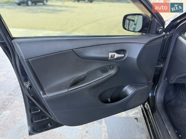 Чорний Тойота Королла, об'ємом двигуна 1.6 л та пробігом 221 тис. км за 6799 $, фото 8 на Automoto.ua