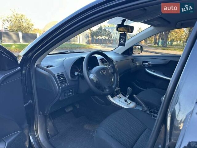 Чорний Тойота Королла, об'ємом двигуна 1.6 л та пробігом 193 тис. км за 5999 $, фото 22 на Automoto.ua
