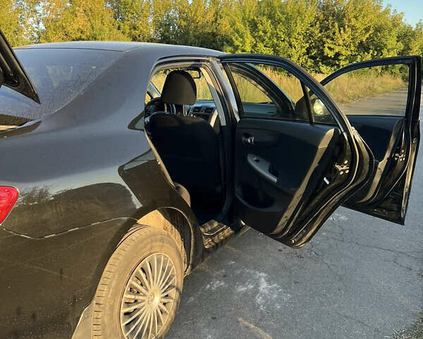 Черный Тойота Королла, объемом двигателя 1.6 л и пробегом 230 тыс. км за 6500 $, фото 10 на Automoto.ua