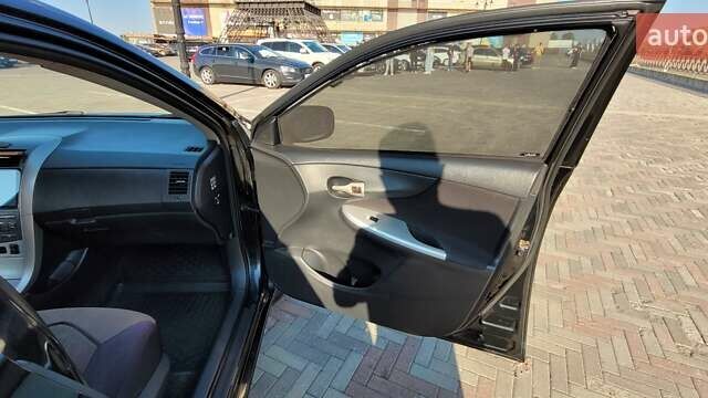 Чорний Тойота Королла, об'ємом двигуна 1.6 л та пробігом 254 тис. км за 6700 $, фото 19 на Automoto.ua