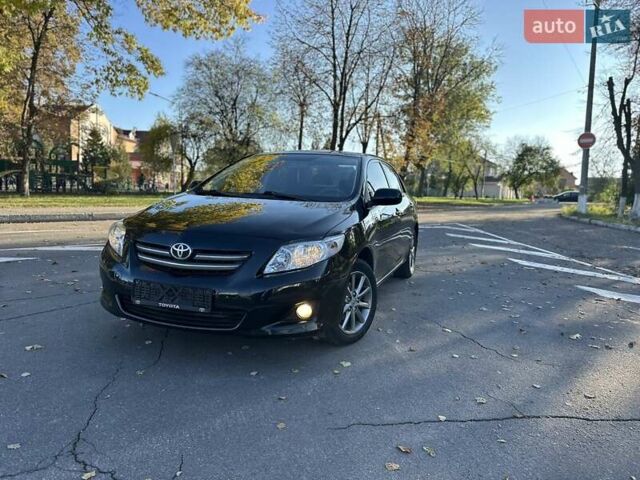 Чорний Тойота Королла, об'ємом двигуна 1.6 л та пробігом 193 тис. км за 5999 $, фото 53 на Automoto.ua