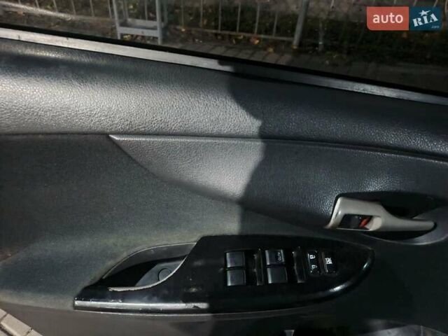 Чорний Тойота Королла, об'ємом двигуна 1.6 л та пробігом 207 тис. км за 6900 $, фото 13 на Automoto.ua