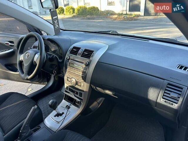Чорний Тойота Королла, об'ємом двигуна 1.6 л та пробігом 193 тис. км за 5999 $, фото 5 на Automoto.ua