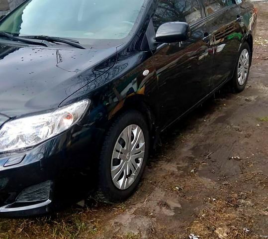 Черный Тойота Королла, объемом двигателя 1.6 л и пробегом 173 тыс. км за 7000 $, фото 1 на Automoto.ua