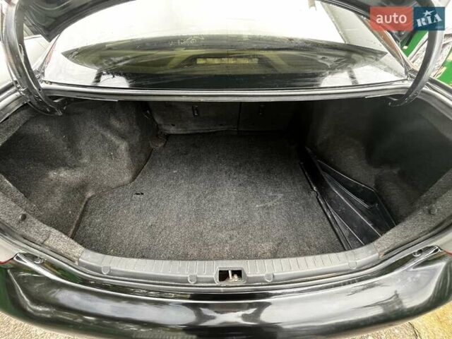 Черный Тойота Королла, объемом двигателя 1.59 л и пробегом 177 тыс. км за 7000 $, фото 10 на Automoto.ua