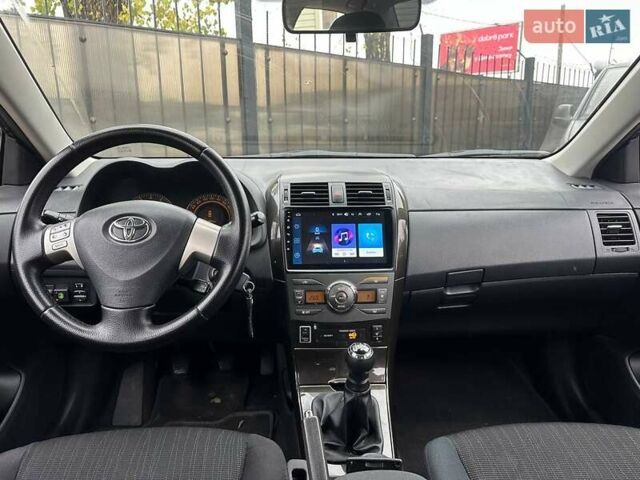 Чорний Тойота Королла, об'ємом двигуна 1.6 л та пробігом 316 тис. км за 7490 $, фото 12 на Automoto.ua