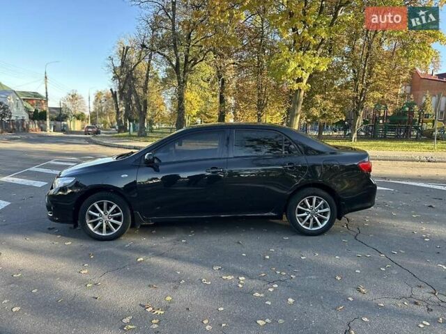 Чорний Тойота Королла, об'ємом двигуна 1.6 л та пробігом 193 тис. км за 5999 $, фото 29 на Automoto.ua