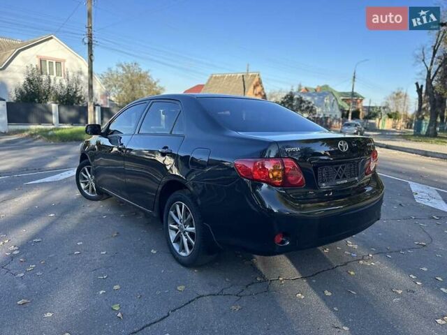 Чорний Тойота Королла, об'ємом двигуна 1.6 л та пробігом 193 тис. км за 5999 $, фото 36 на Automoto.ua