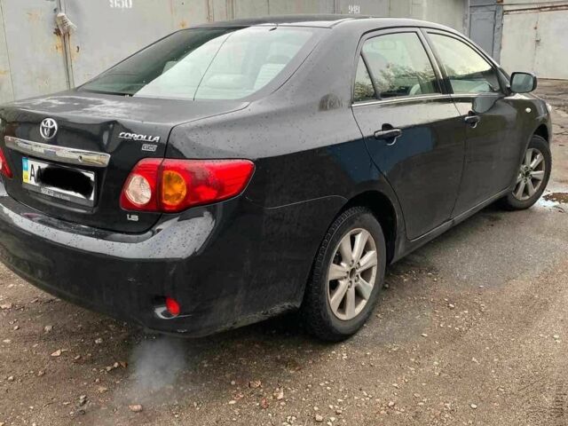 Чорний Тойота Королла, об'ємом двигуна 1.8 л та пробігом 205 тис. км за 5500 $, фото 14 на Automoto.ua