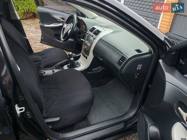 Черный Тойота Королла, объемом двигателя 1.6 л и пробегом 210 тыс. км за 6200 $, фото 11 на Automoto.ua