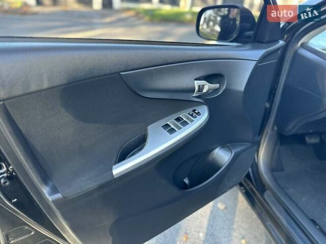 Чорний Тойота Королла, об'ємом двигуна 1.6 л та пробігом 193 тис. км за 5999 $, фото 21 на Automoto.ua