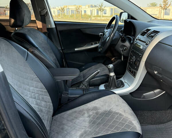 Чорний Тойота Королла, об'ємом двигуна 1.6 л та пробігом 150 тис. км за 6300 $, фото 12 на Automoto.ua
