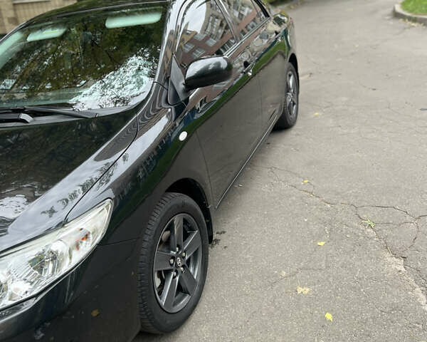 Чорний Тойота Королла, об'ємом двигуна 1.6 л та пробігом 147 тис. км за 7700 $, фото 5 на Automoto.ua