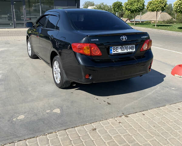 Чорний Тойота Королла, об'ємом двигуна 1.6 л та пробігом 223 тис. км за 7000 $, фото 7 на Automoto.ua