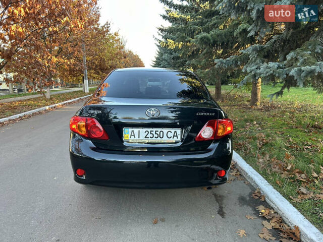 Черный Тойота Королла, объемом двигателя 1.6 л и пробегом 42 тыс. км за 10300 $, фото 21 на Automoto.ua