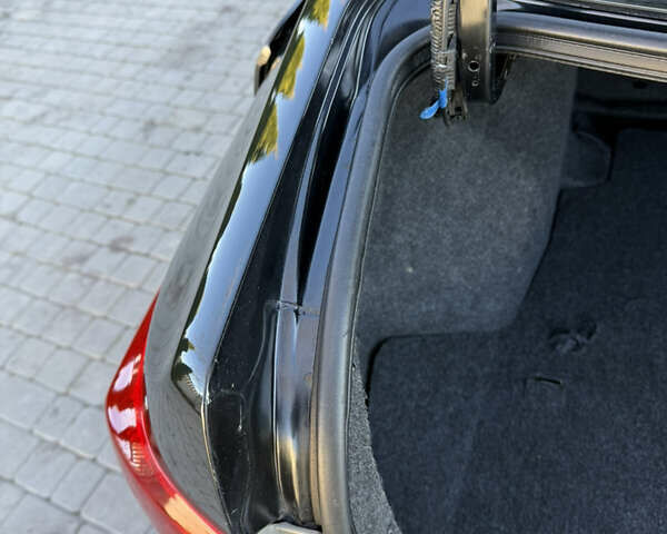 Черный Тойота Королла, объемом двигателя 1.6 л и пробегом 147 тыс. км за 6999 $, фото 78 на Automoto.ua