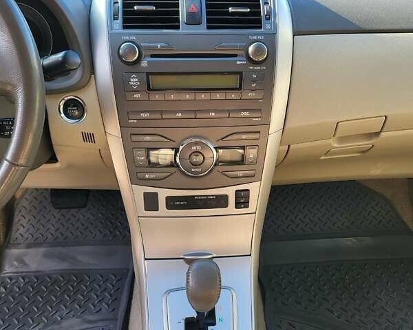 Чорний Тойота Королла, об'ємом двигуна 1.6 л та пробігом 195 тис. км за 8500 $, фото 7 на Automoto.ua