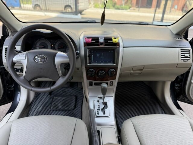 Чорний Тойота Королла, об'ємом двигуна 1.8 л та пробігом 191 тис. км за 7599 $, фото 12 на Automoto.ua