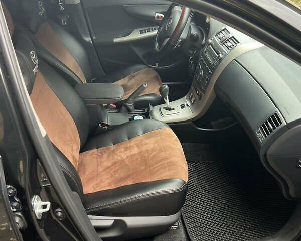 Чорний Тойота Королла, об'ємом двигуна 1.6 л та пробігом 147 тис. км за 7700 $, фото 10 на Automoto.ua