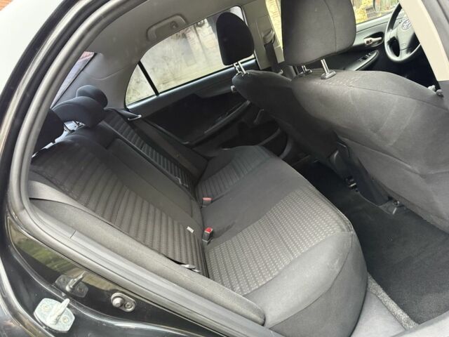 Черный Тойота Королла, объемом двигателя 1.6 л и пробегом 149 тыс. км за 6100 $, фото 17 на Automoto.ua