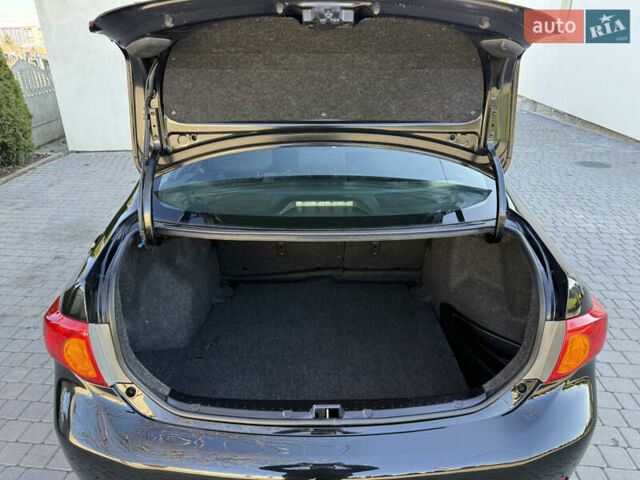 Черный Тойота Королла, объемом двигателя 1.6 л и пробегом 147 тыс. км за 6999 $, фото 76 на Automoto.ua