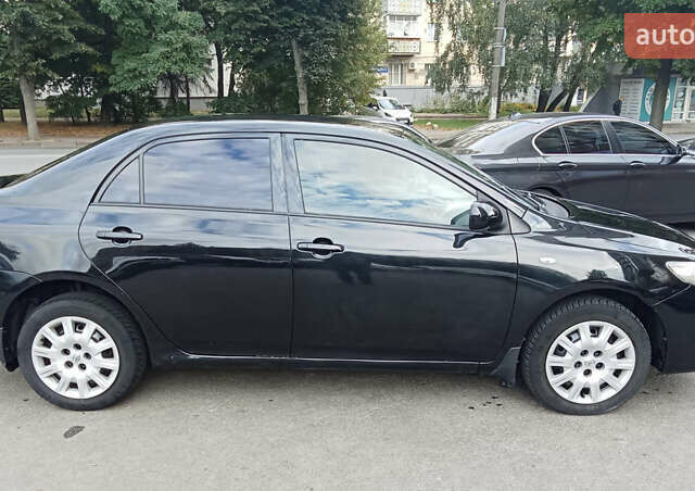 Чорний Тойота Королла, об'ємом двигуна 1.6 л та пробігом 226 тис. км за 6300 $, фото 11 на Automoto.ua