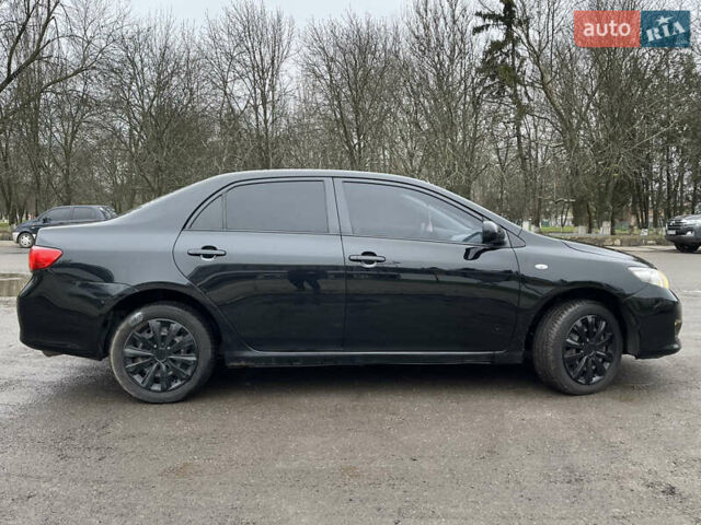 Чорний Тойота Королла, об'ємом двигуна 1.6 л та пробігом 208 тис. км за 7200 $, фото 4 на Automoto.ua