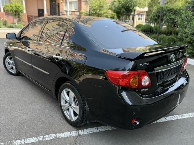 Чорний Тойота Королла, об'ємом двигуна 1.8 л та пробігом 191 тис. км за 7599 $, фото 8 на Automoto.ua