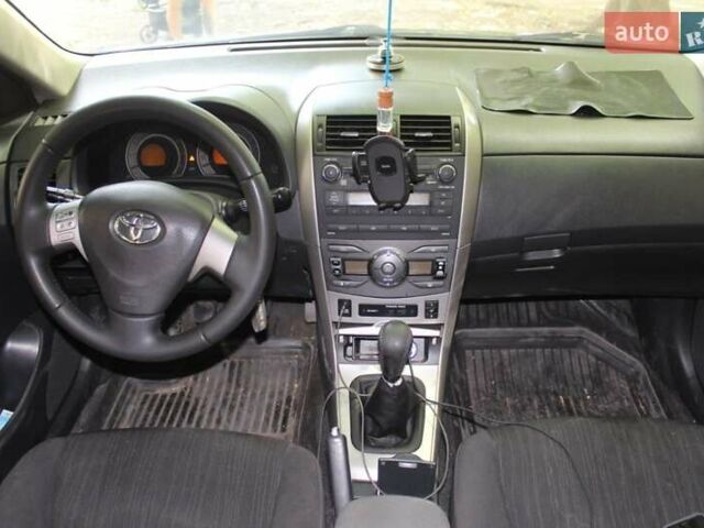 Черный Тойота Королла, объемом двигателя 1.6 л и пробегом 250 тыс. км за 5000 $, фото 1 на Automoto.ua