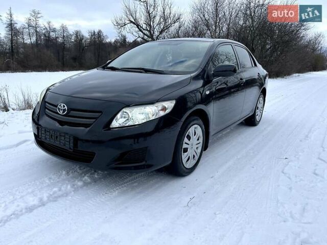 Чорний Тойота Королла, об'ємом двигуна 1.6 л та пробігом 162 тис. км за 7200 $, фото 23 на Automoto.ua