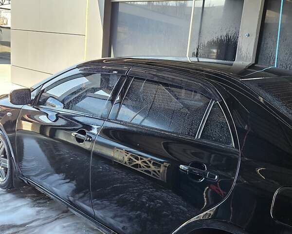 Чорний Тойота Королла, об'ємом двигуна 1.6 л та пробігом 170 тис. км за 5800 $, фото 1 на Automoto.ua
